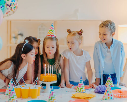 small-kids-celebrate-birthday-party-blow-candles-2022-06-30-19-16-26-utc (1) (1)